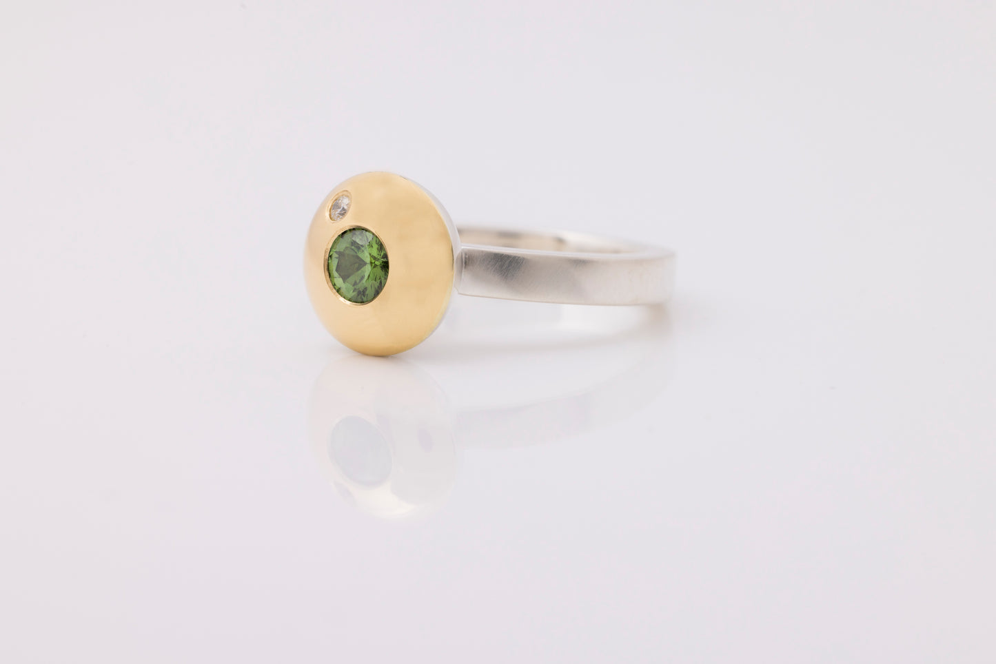 Domed Green Sapphire And Diamond Ring